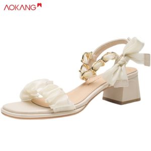 Aokang dây móc nối ngọc trai Xếp Li Thắt Nơ Phong Cách Cổ Tích Mới  184.000 ₫ cho nữ Xăng đan cao gót dày Xăng đan cao gót cao
